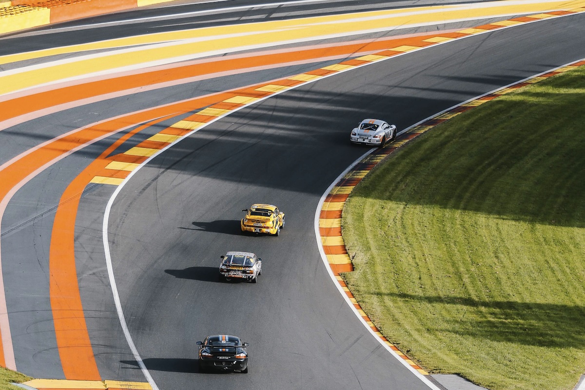 Climbing 102 feet through Raidillon's crest — a make-or-break section where Spa's 12% gradient compresses suspensions and demands full trust in grip and commitment.