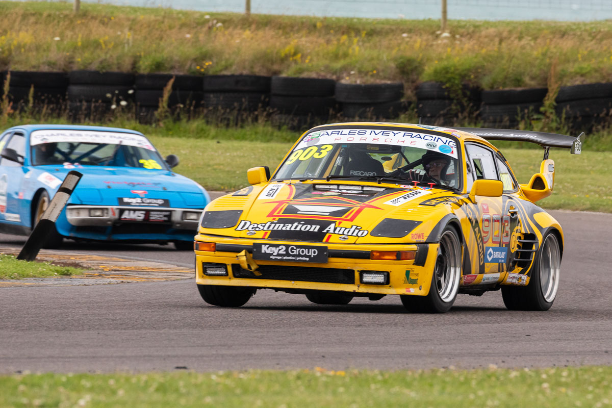 VANHAUEN RACING at Anglesey 2025 - Morning preparations with the 903 looking pristine against the Welsh coastal backdrop.