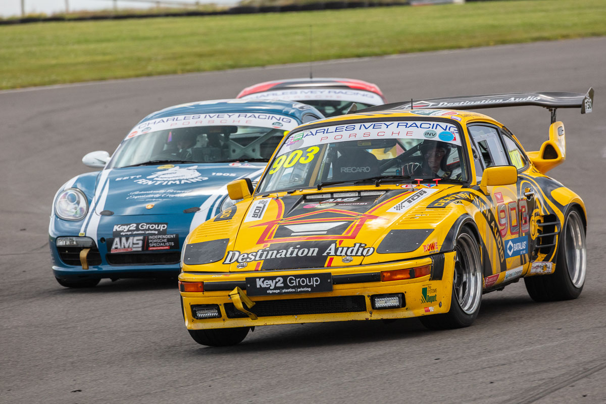 VANHAUEN RACING at Anglesey 2025 - The spoiler controversy being resolved with quick engineering work from Phil at Brough Motorsport.