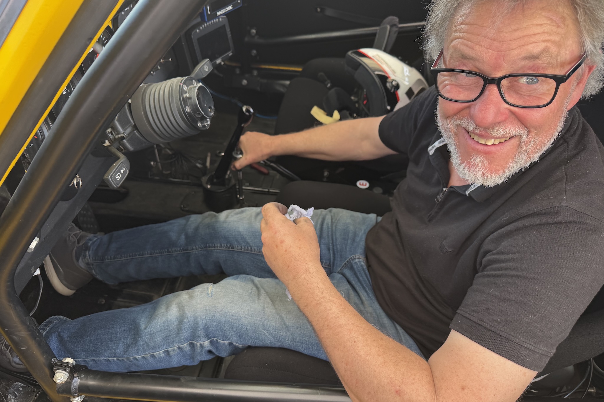 VANHAUEN RACING at Donington Park 2026 - Phil Brough attempting to adjust the gear shifter to engage fifth before Race 2.